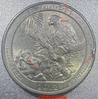 2012 quarter strike-through error showing design void where foreign object blocked the die strike